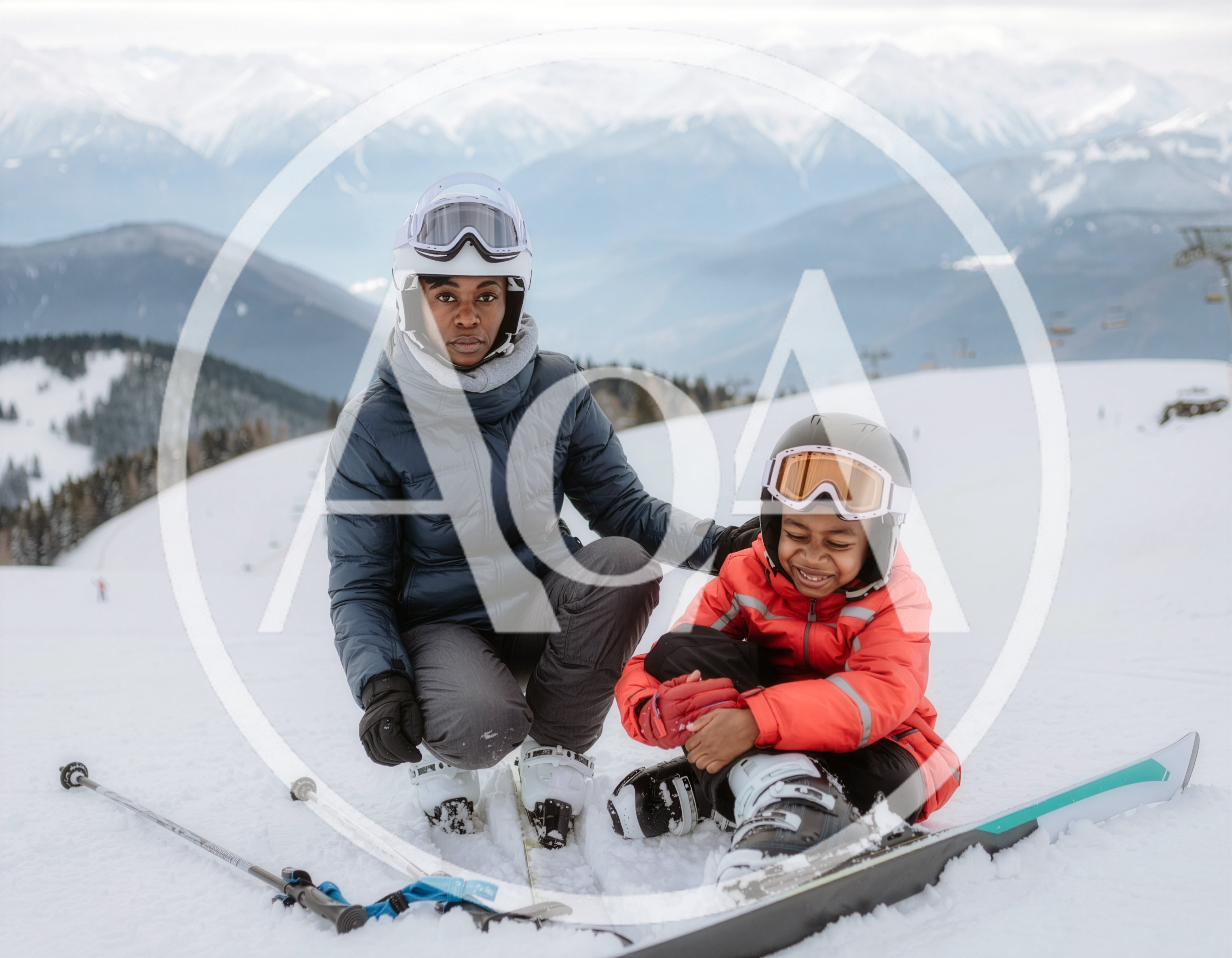 Mother And Son Skiing On Snowy Mountain Slope
