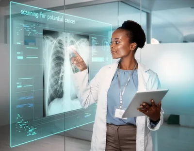 Female Doctor Analyzing Medical X-Ray On Digital Interface