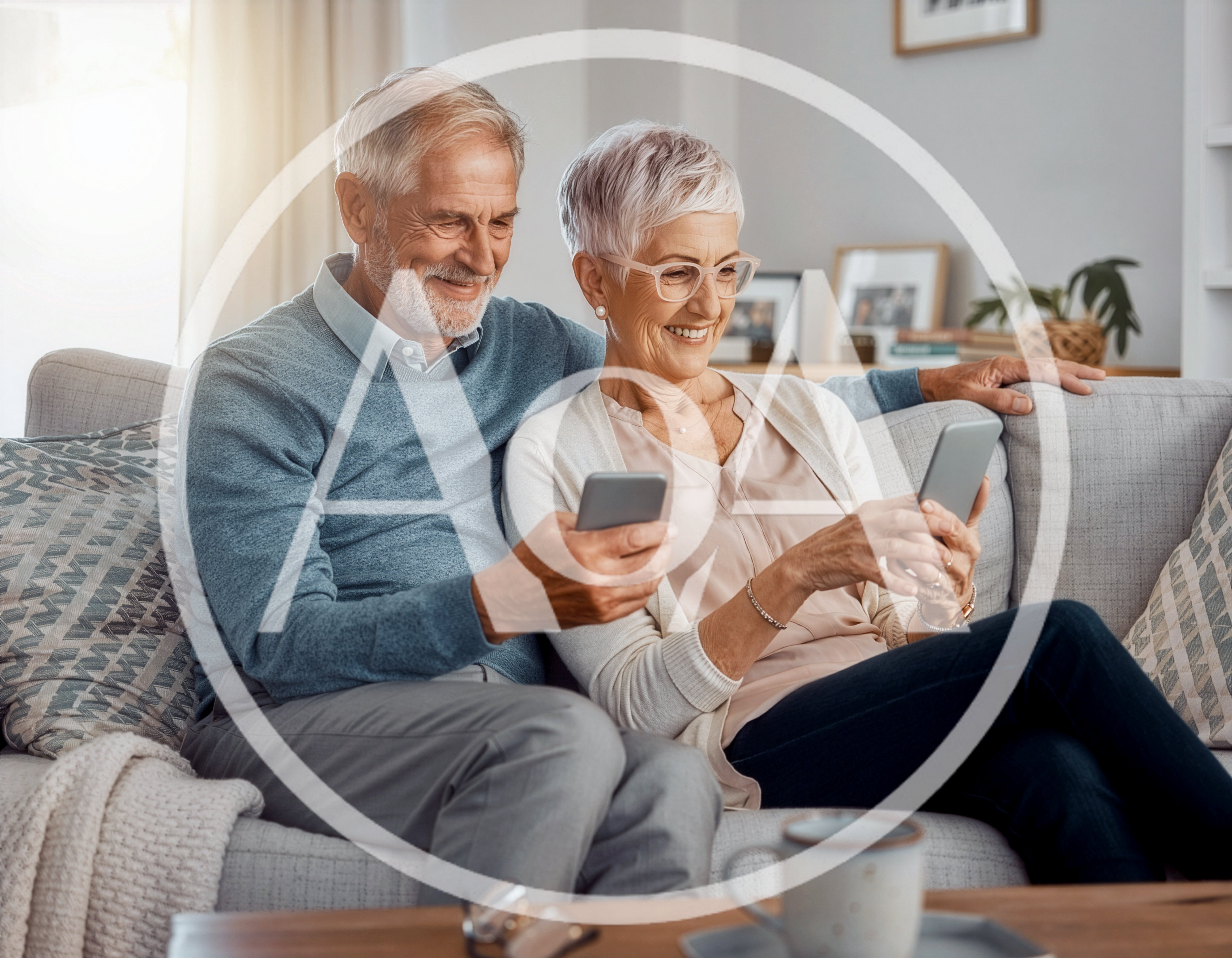 Senior Couple Using Smartphones Together on Sofa