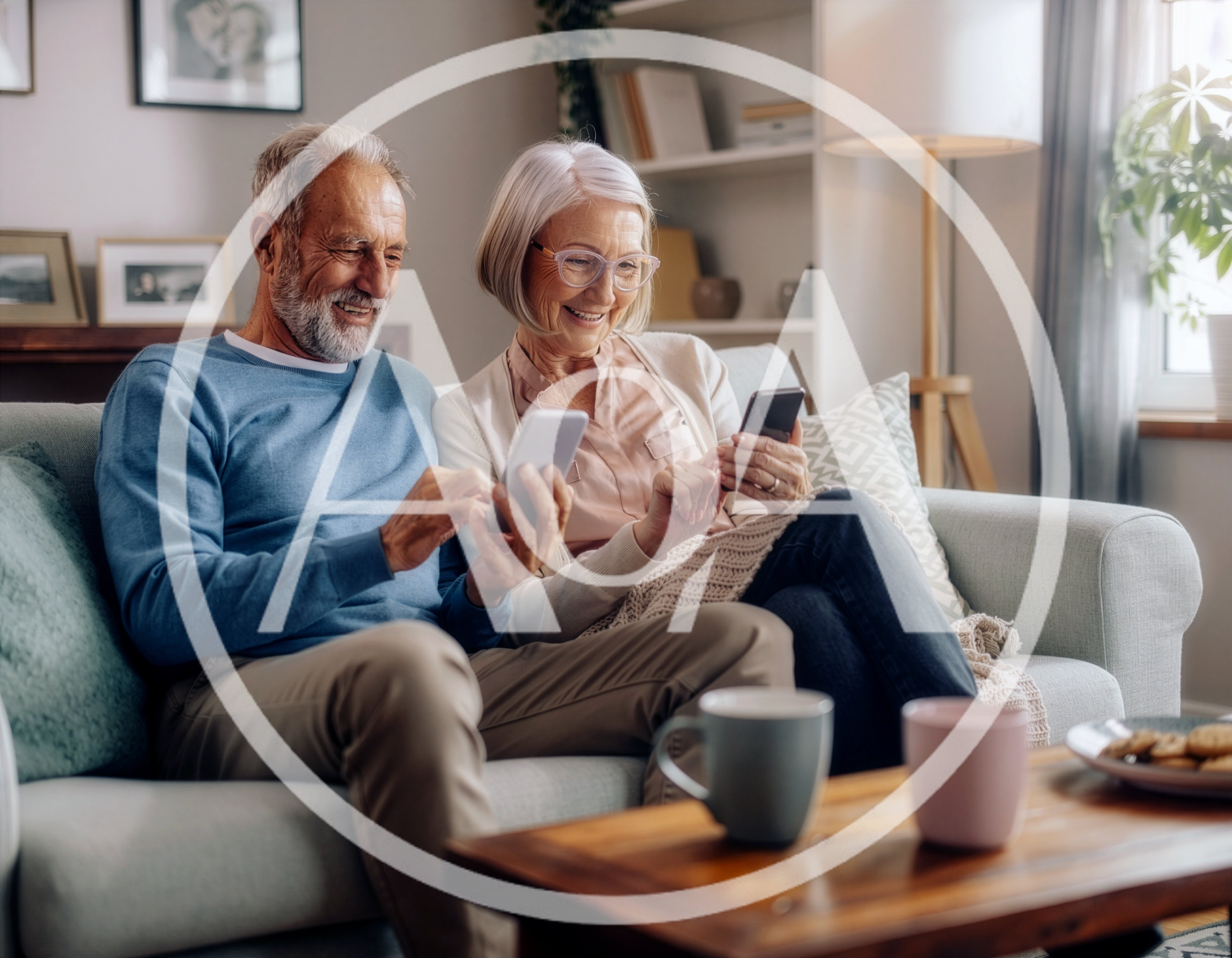 Senior Couple Using Smartphones Together on Sofa