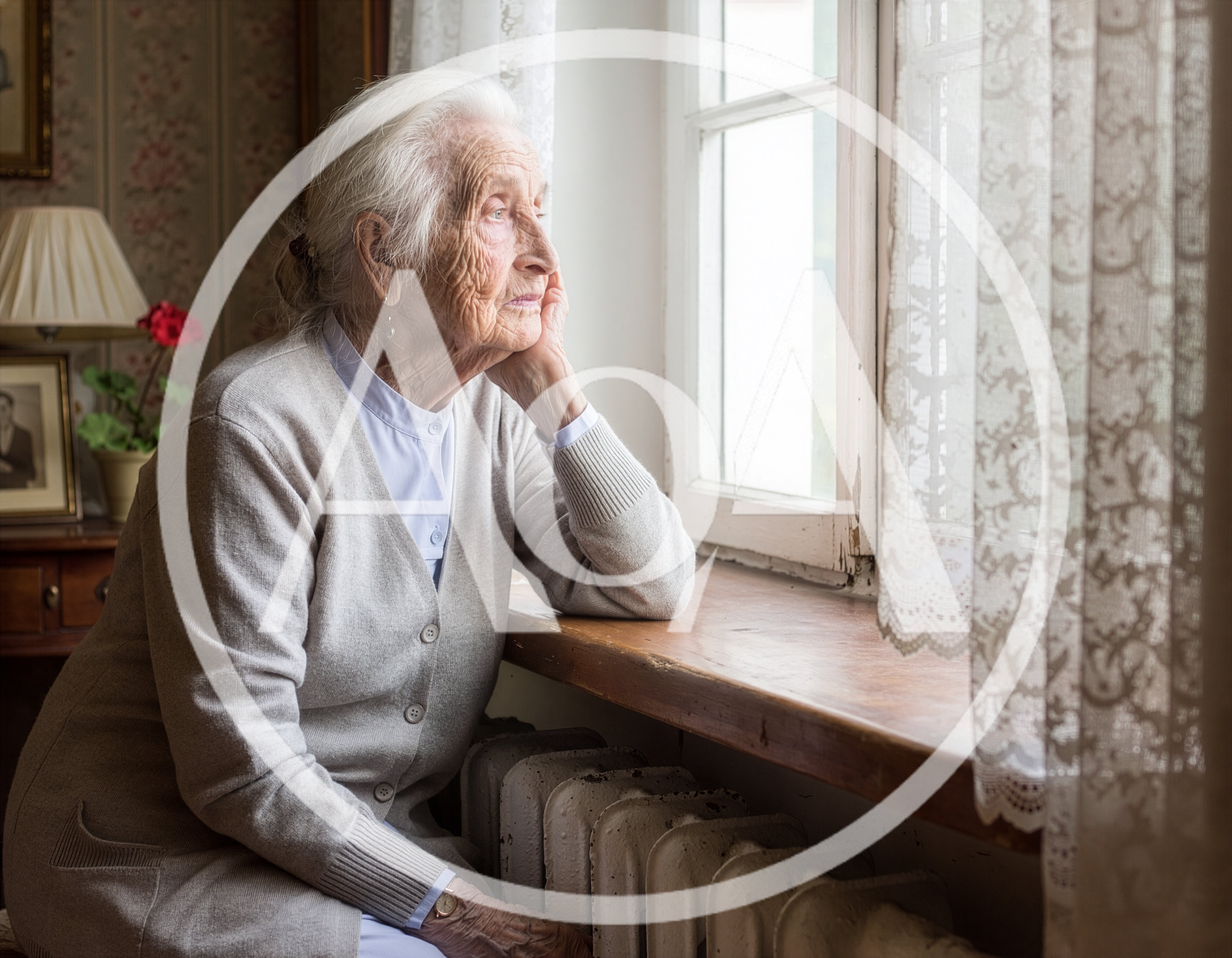 Elderly Woman Looking Out A Window
