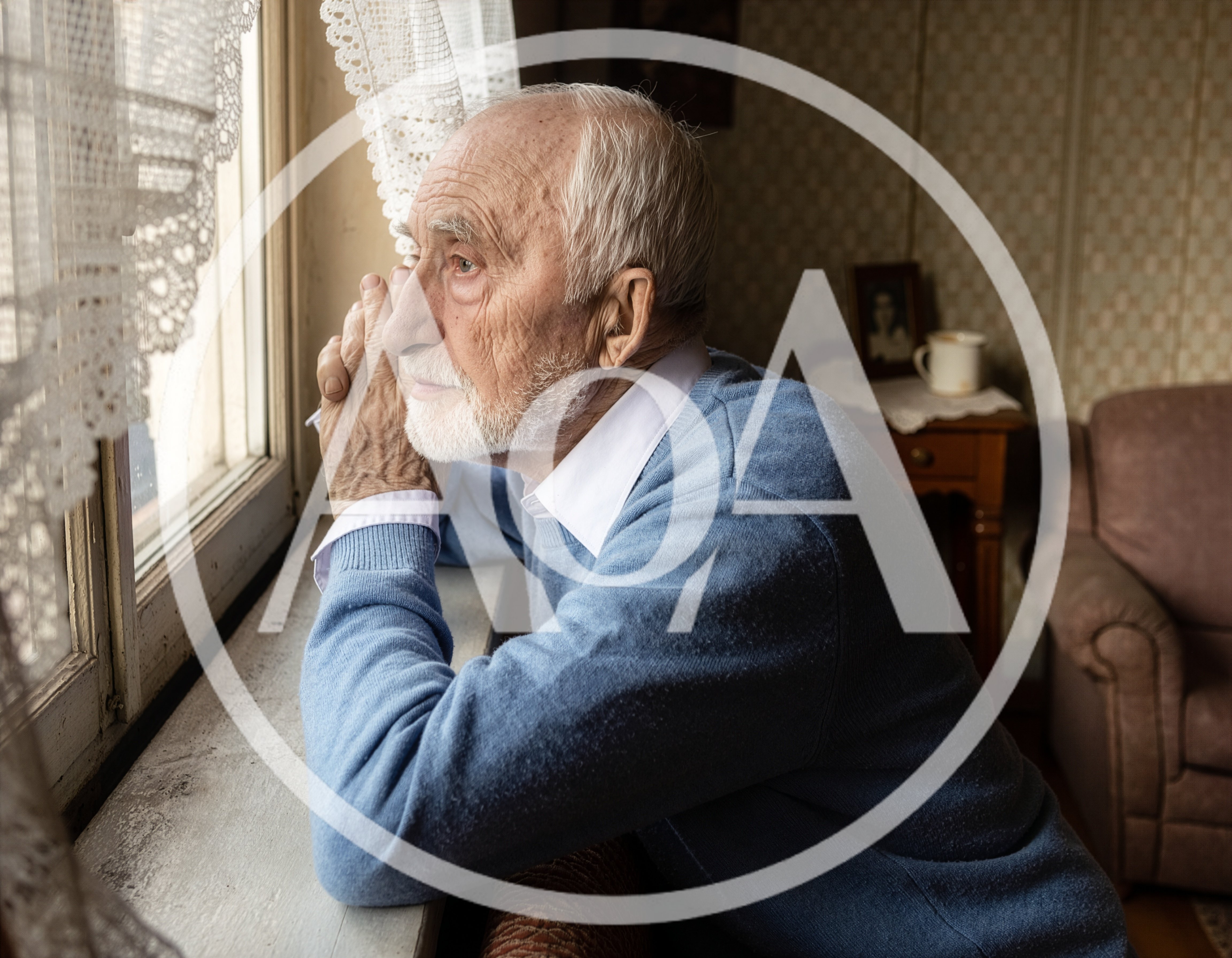 Elderly Man Looking Out A Window