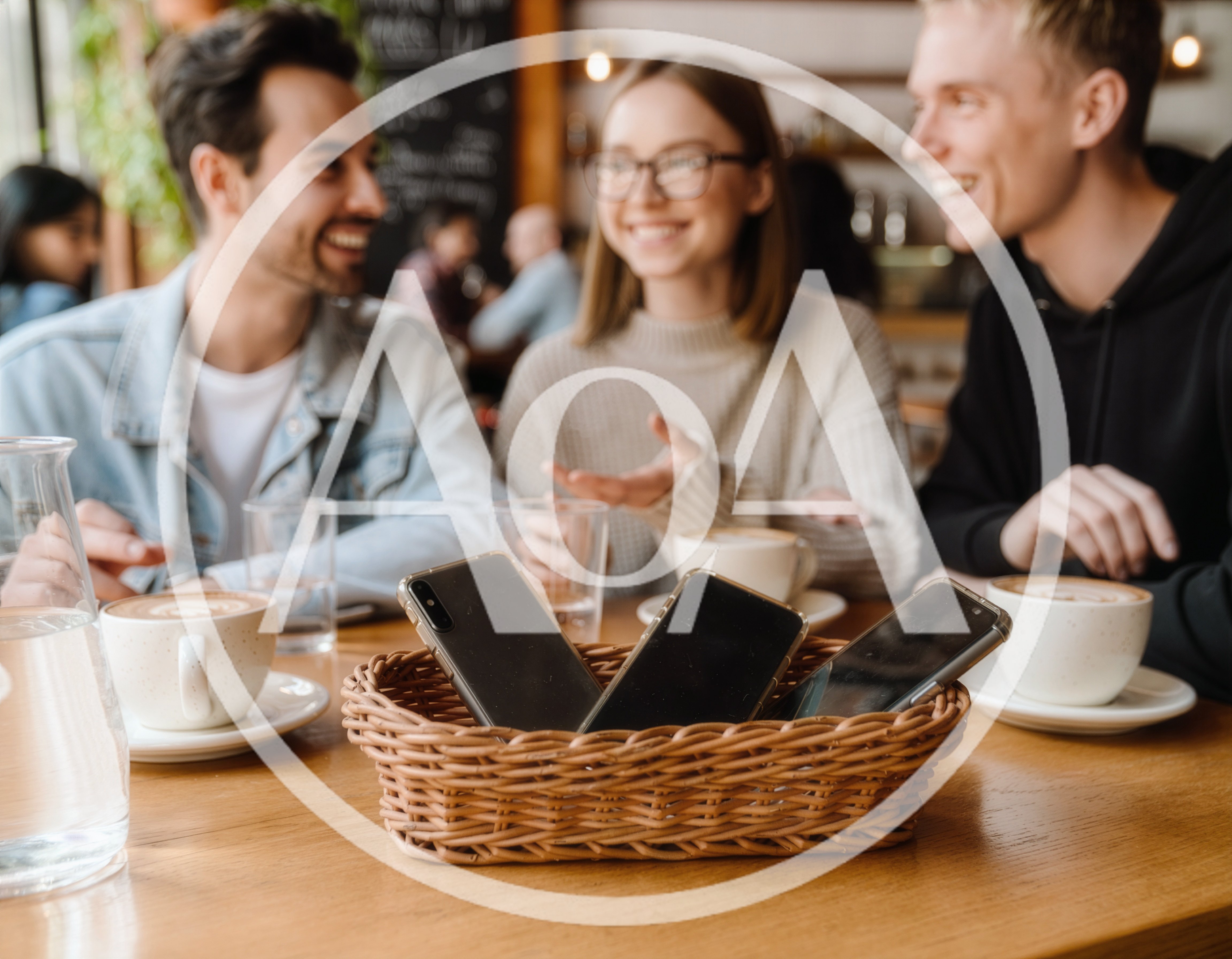 Friends Socializing at a Cafe with Phones in Basket