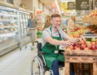 Disabled Grocery Store Employee Sorting Fresh Apples