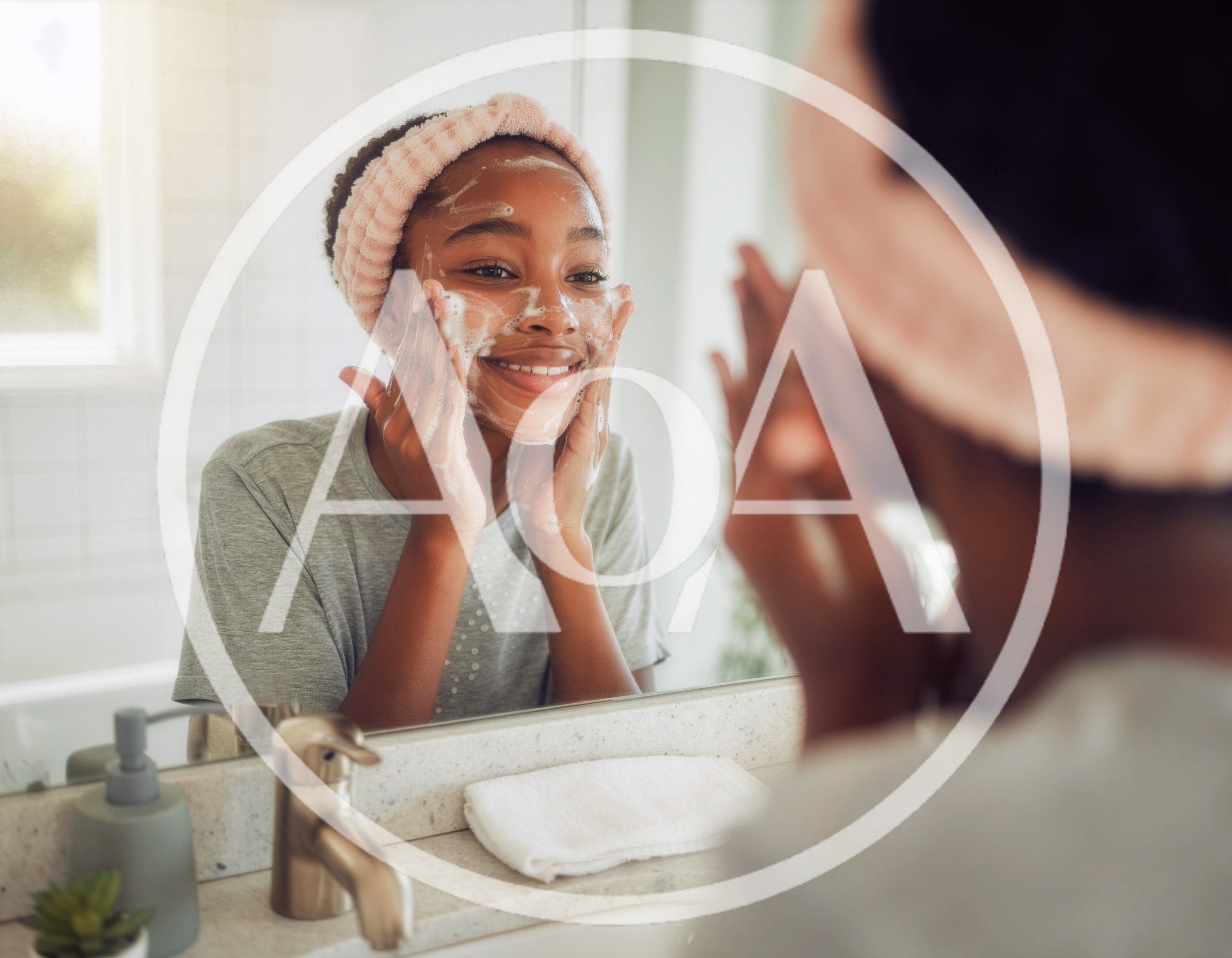 Young Woman Washing Face With Cleanser In Bathroom