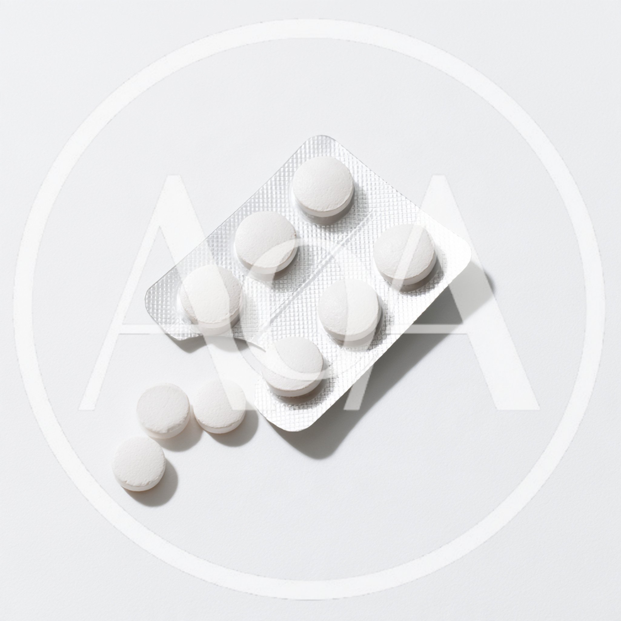 White Pills In Blister Pack On White Background