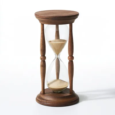 Wooden Hourglass With Flowing Sand On White Background