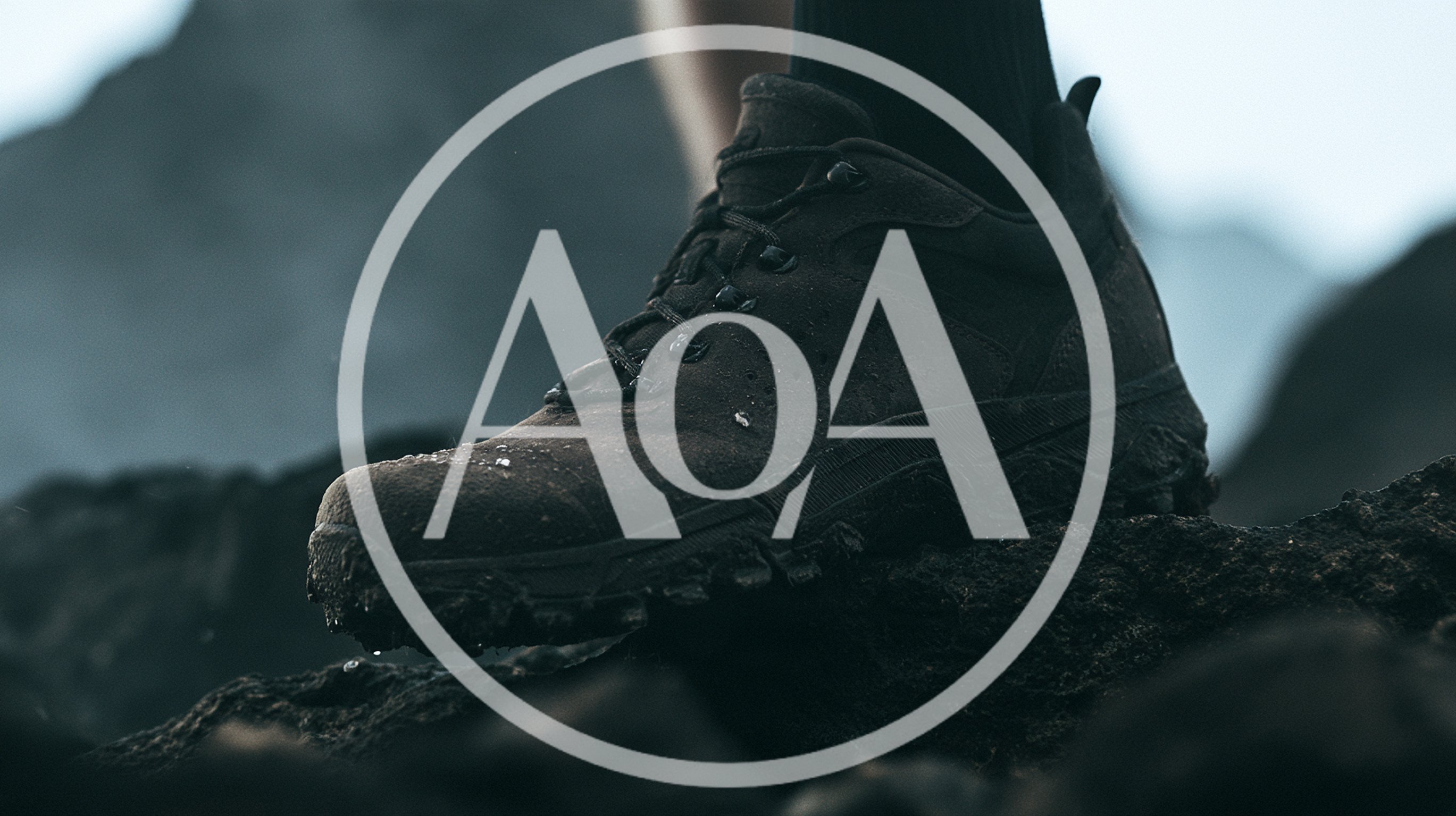 Close Up Of Hiking Boot Stepping On Rocky Terrain