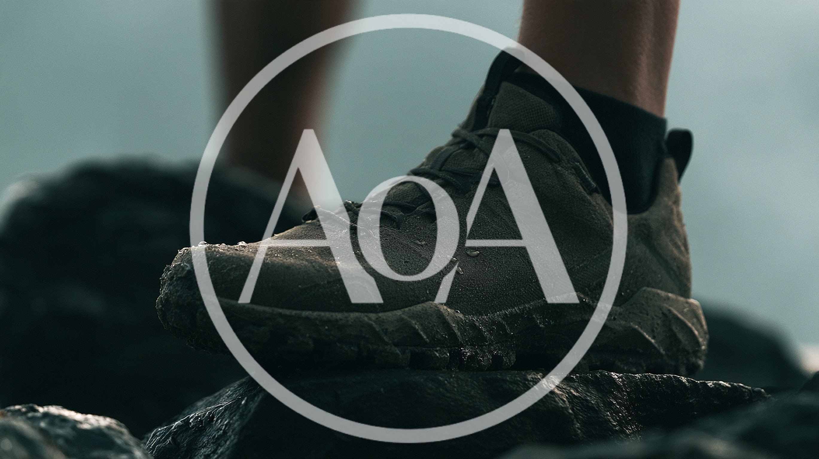 Close Up Of Hiking Boot On Wet Rock