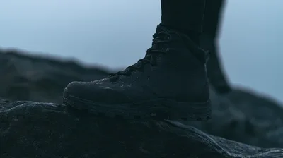 Close Up Of A Hiker Wearing Waterproof Boots