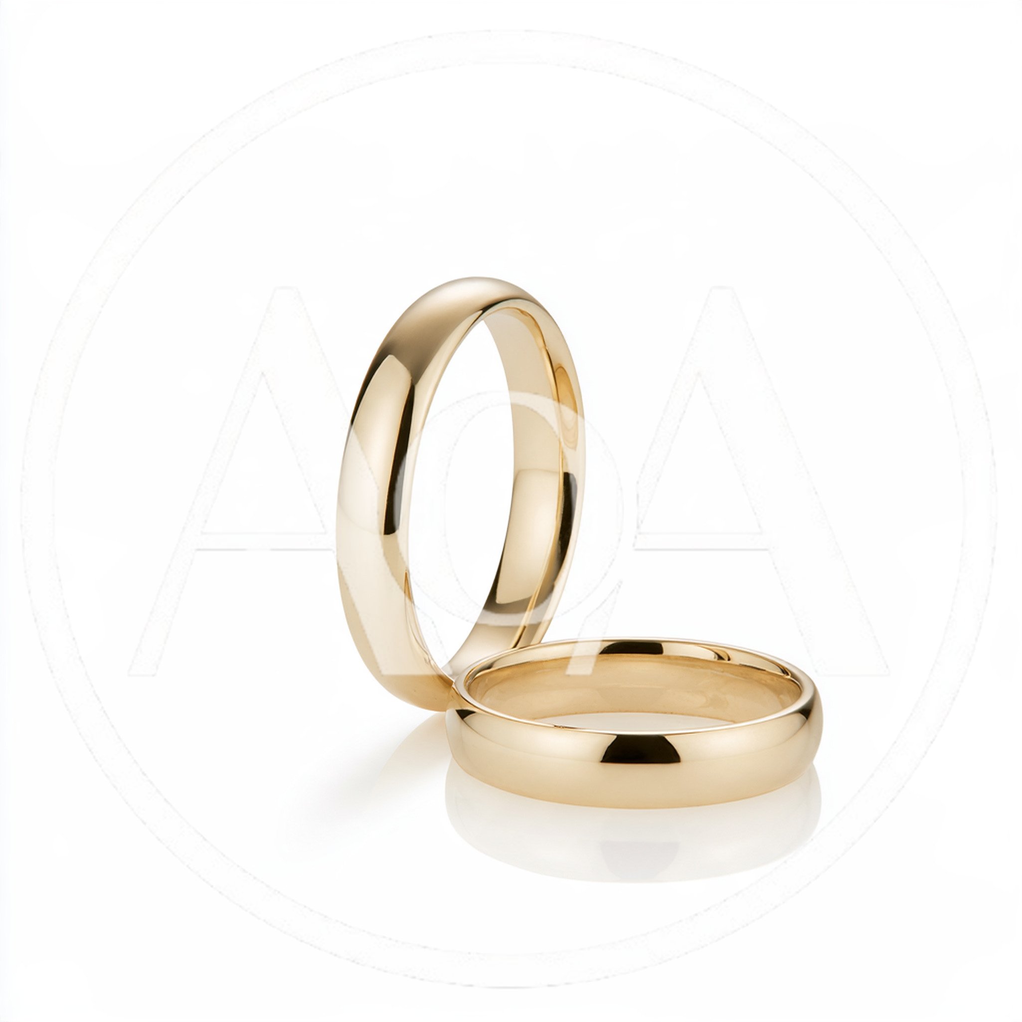 Two Polished Gold Wedding Bands On White Background