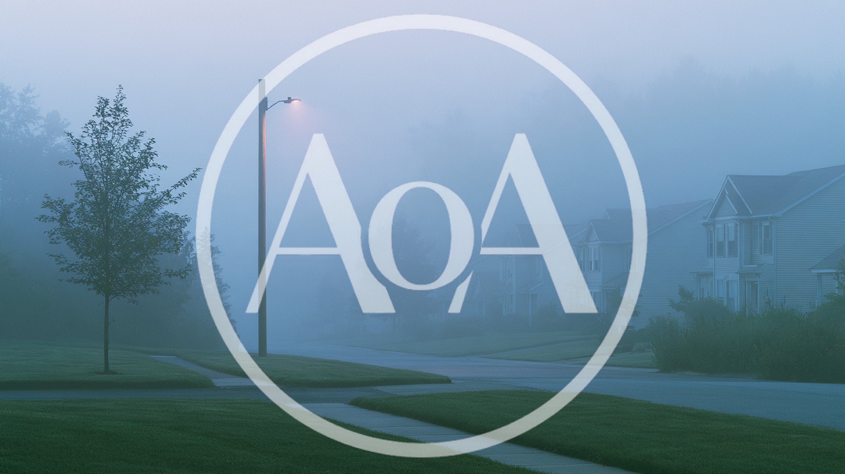 Suburban Street Scene In Dense Morning Fog