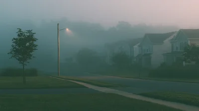 Suburban Street Scene In Dense Morning Fog