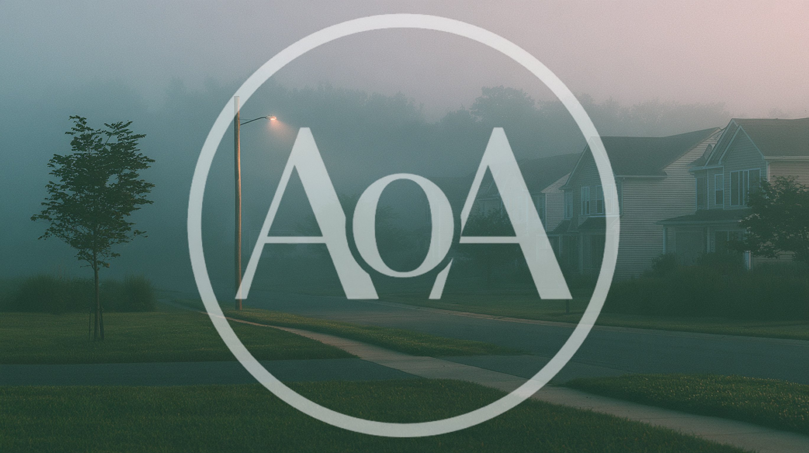 Suburban Street Scene In Dense Morning Fog