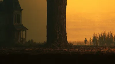Eerie Silhouette Of A Scarecrow Near A Haunted House
