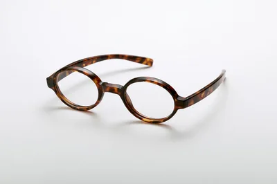 Tortoiseshell Round Frame Glasses on White Background