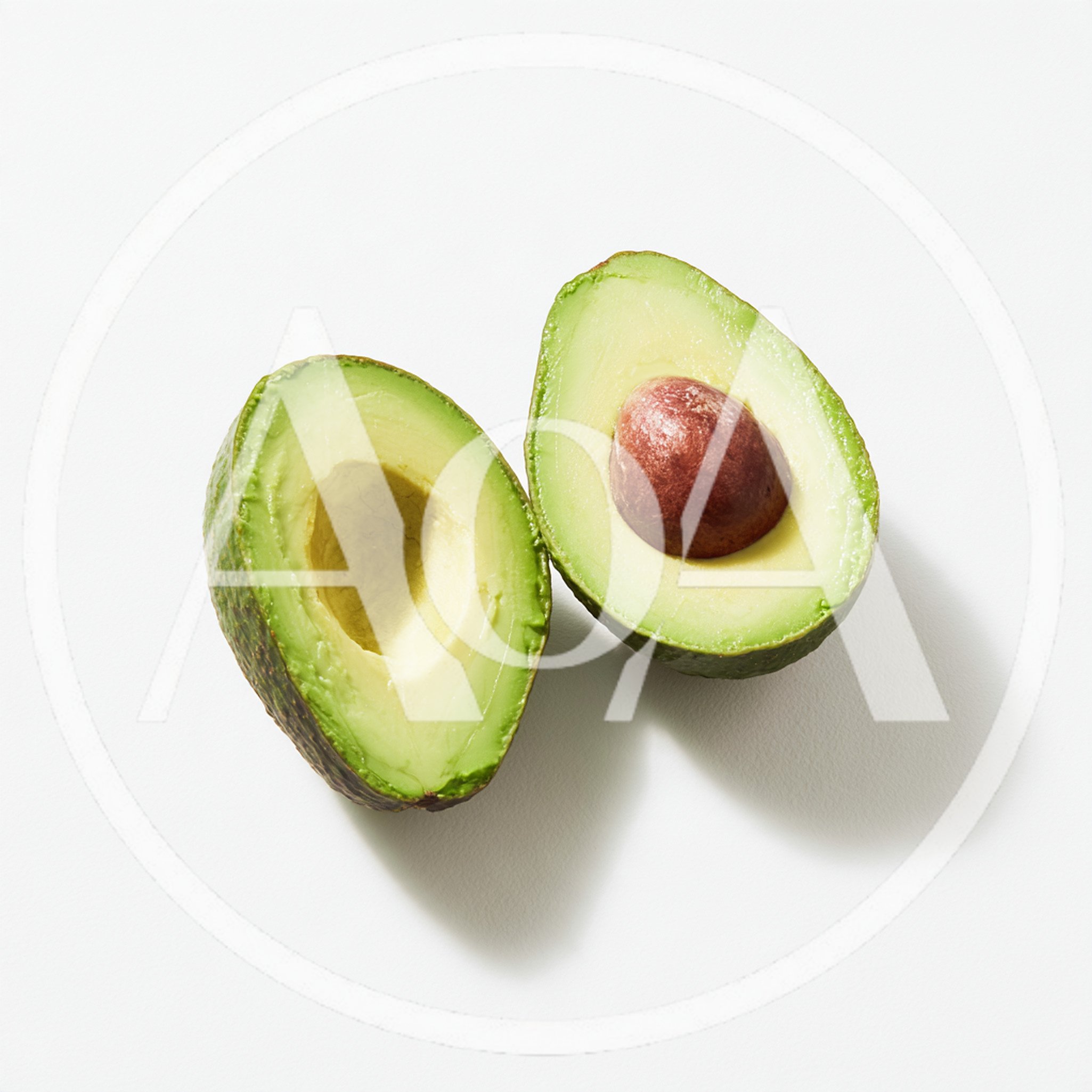 Two Halves Of A Fresh Ripe Avocado