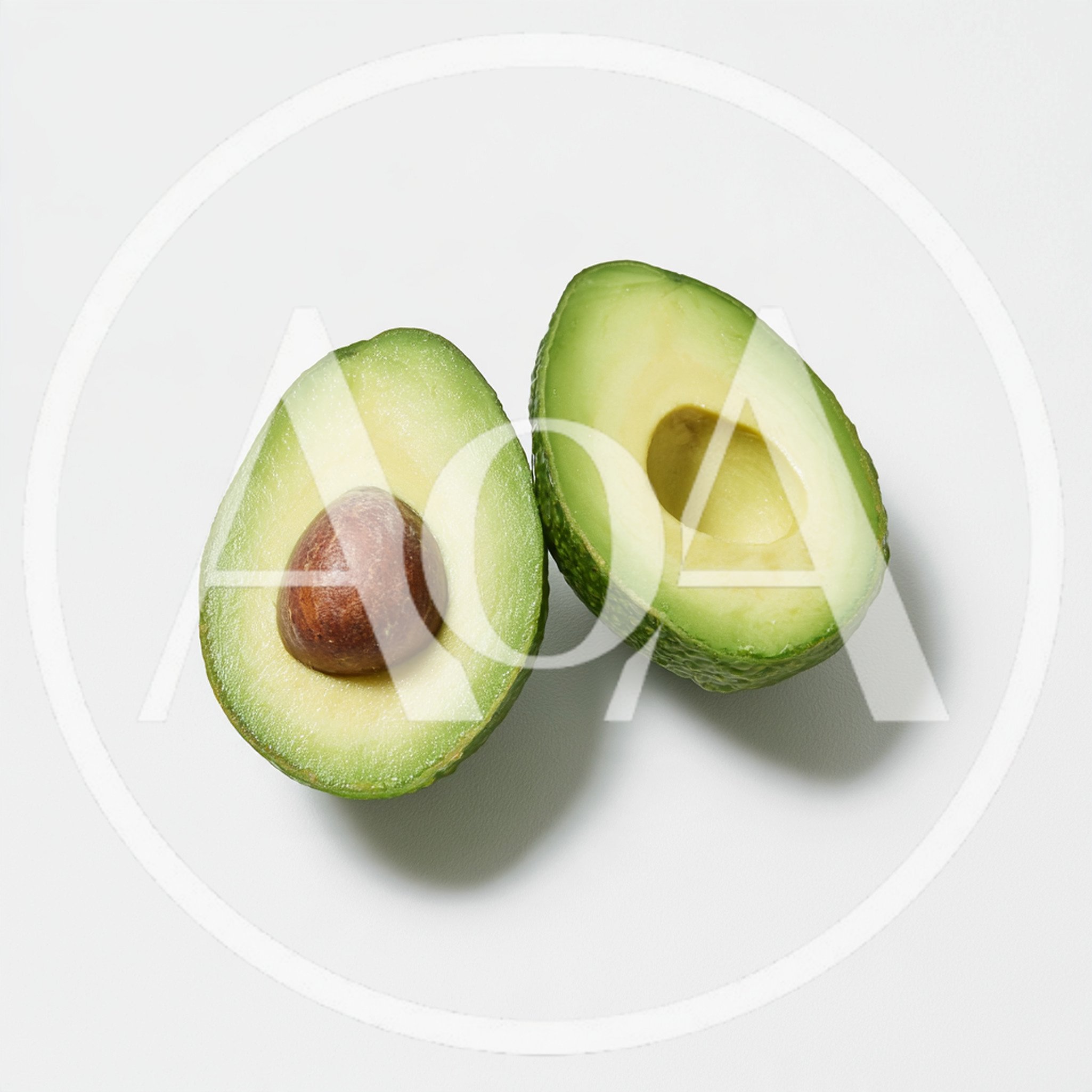 Two Halves Of A Fresh Ripe Avocado