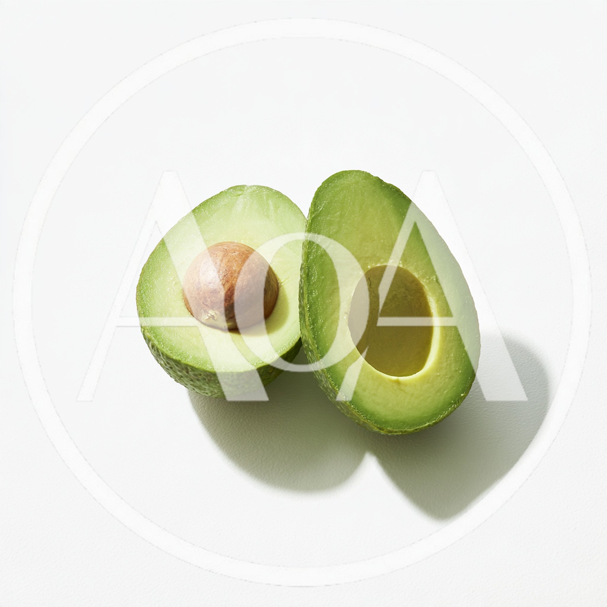 Two Halves Of A Fresh Ripe Avocado