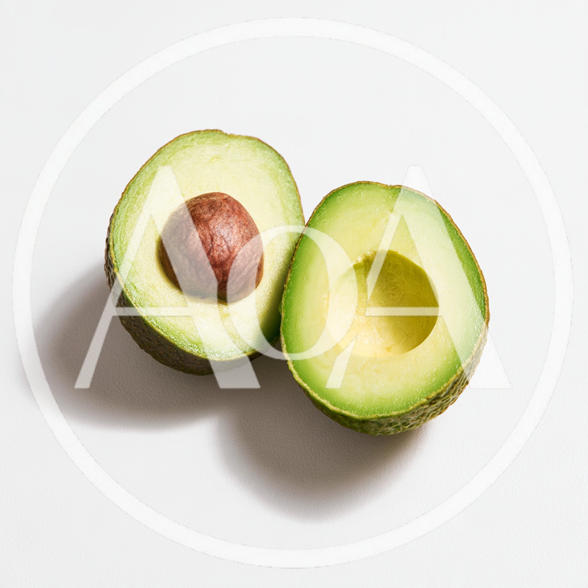 Two Halves Of A Fresh Ripe Avocado