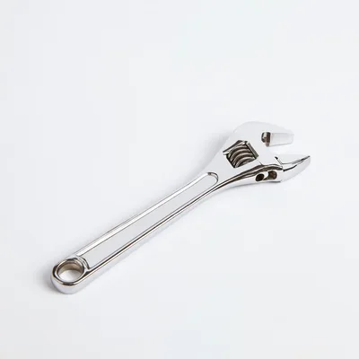 Adjustable Chrome Wrench on White Background