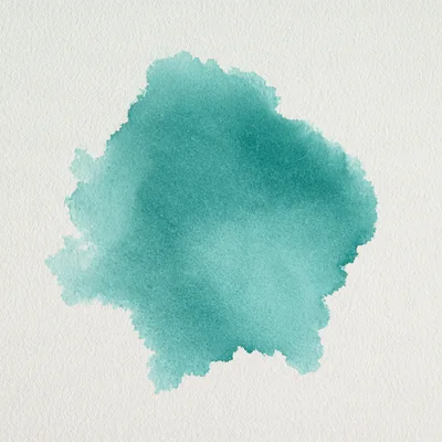 Teal Watercolor Paint Splatter On Textured Paper