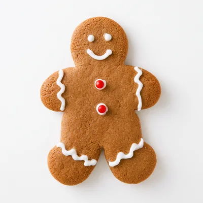 Single Gingerbread Man Cookie On White Background