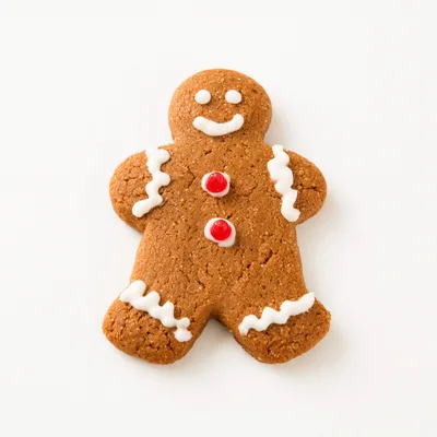 Single Gingerbread Man Cookie On White Background