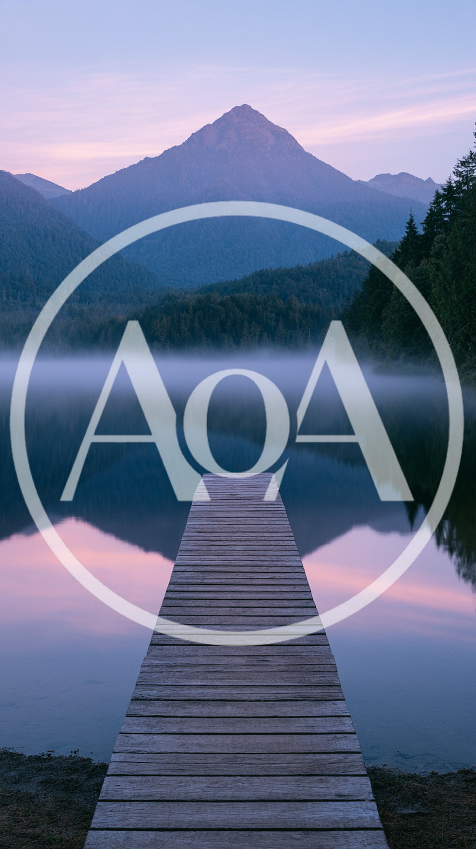 Wooden Pier Extending Into A Misty Mountain Lake