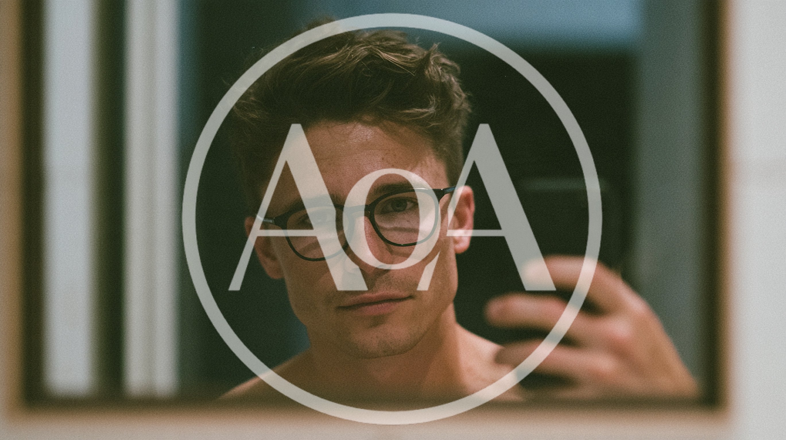 Young Man Taking A Mirror Selfie