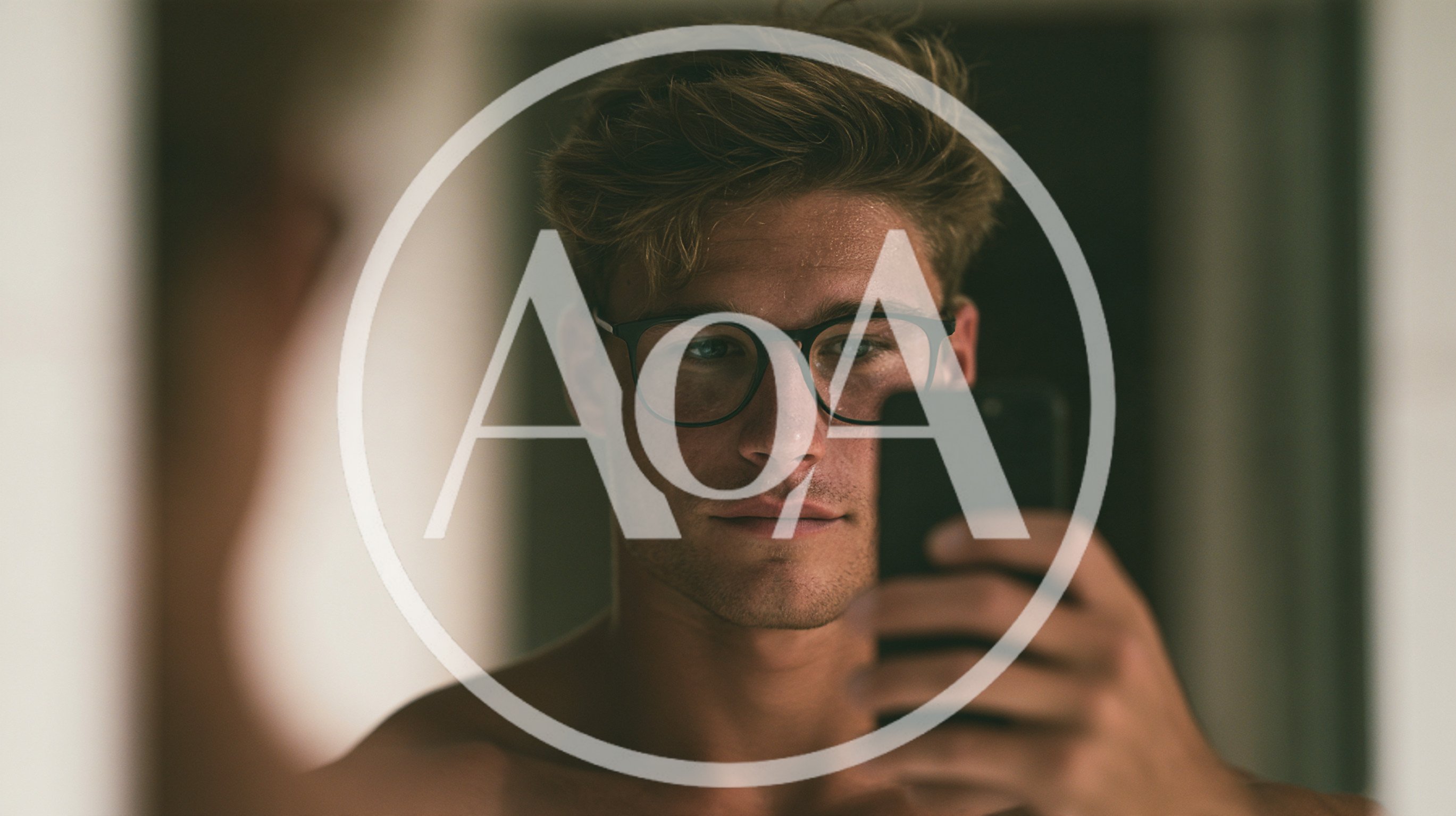 Young Man Taking A Selfie In A Mirror