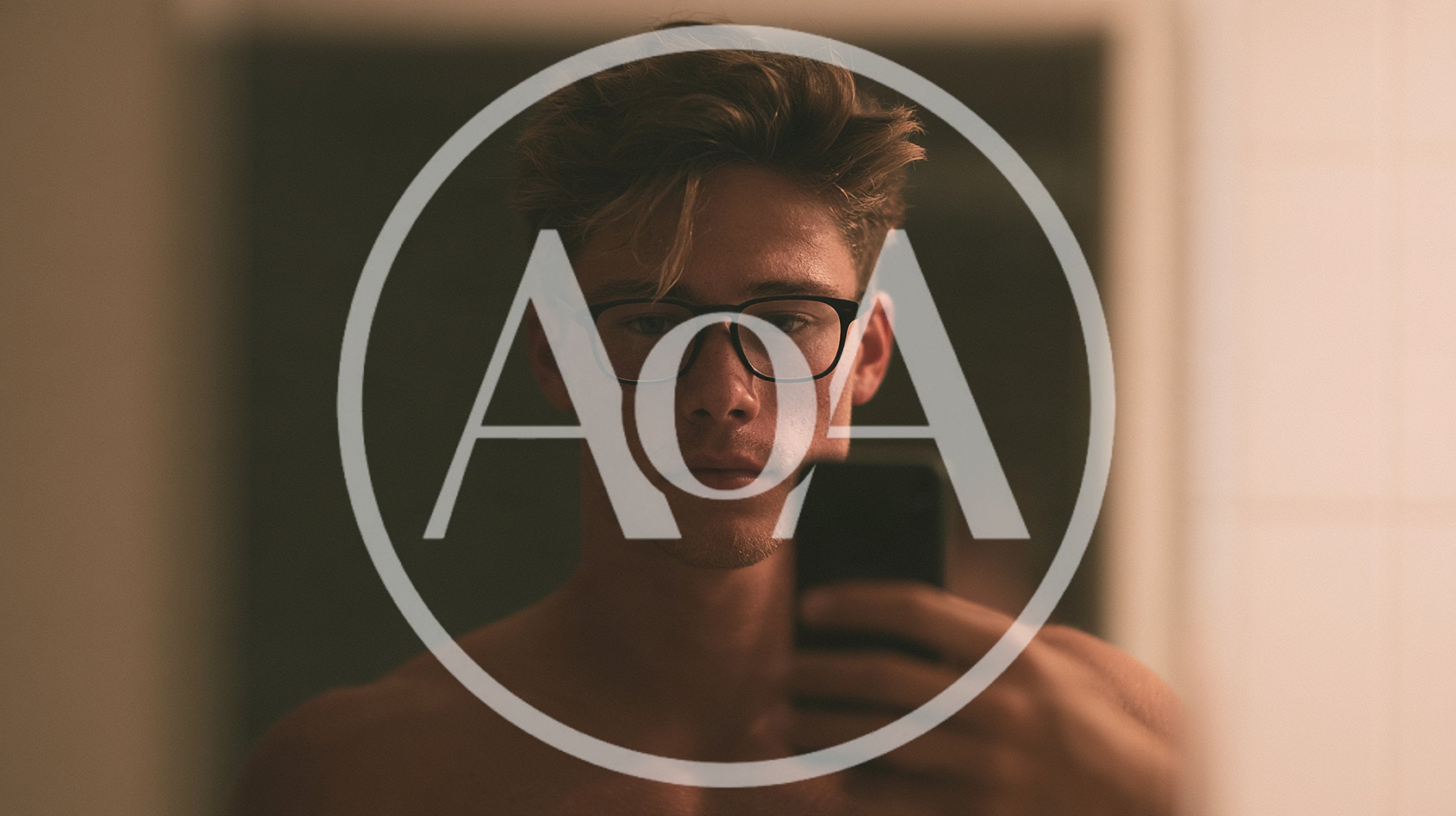 Young Man Taking A Mirror Selfie In Dim Lighting