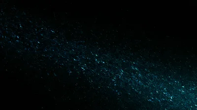 Abstract Blue Light Particles On Dark Background
