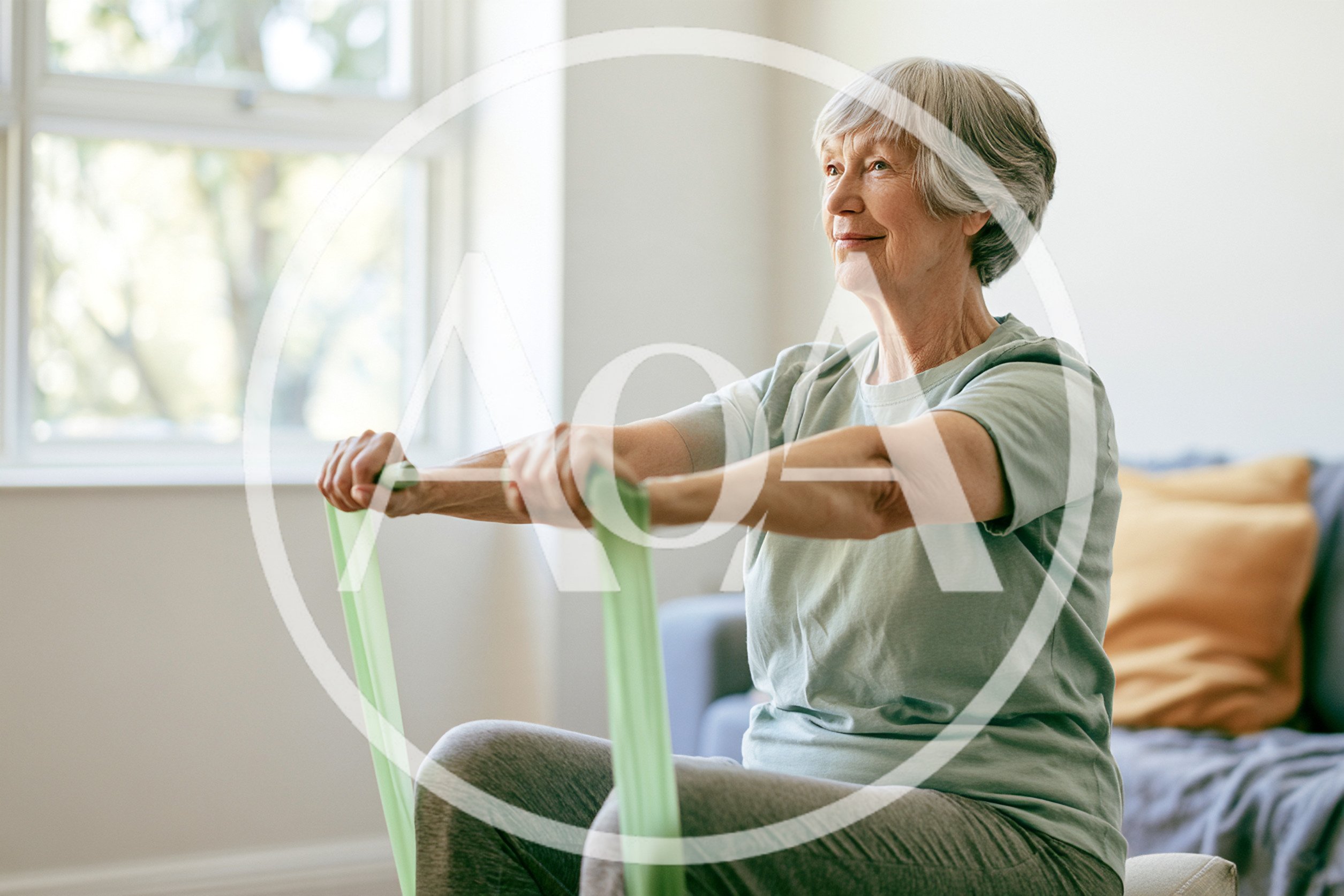 Senior Woman Exercising With Resistance Band At Home