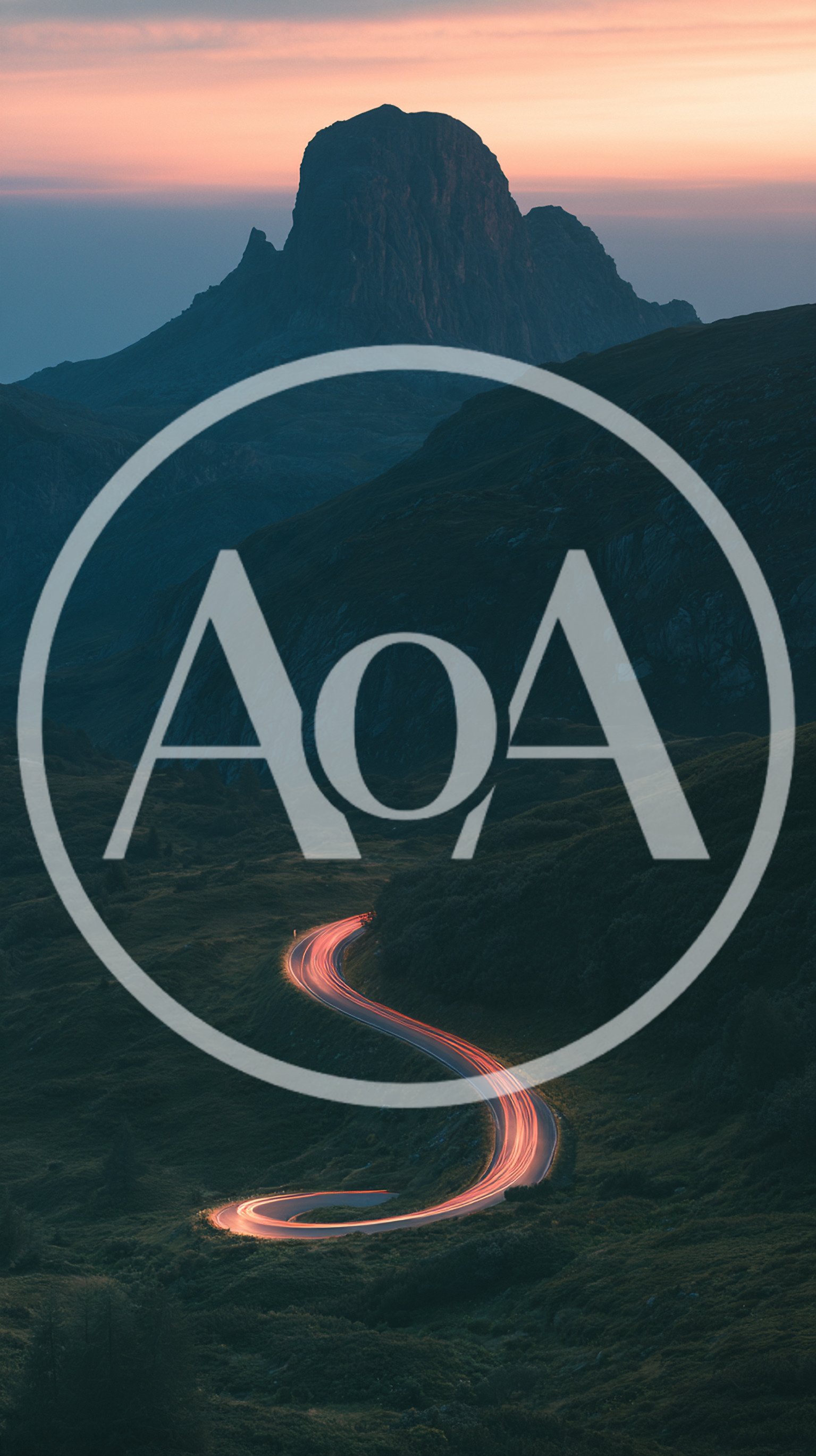 Winding Mountain Road With Car Light Trails At Dusk