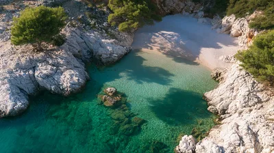 Aerial View Of A Secluded Mediterranean Pebble Beach