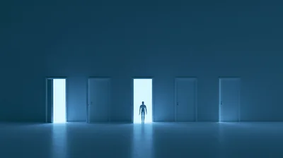 Mannequin Standing Before Open Door In Dark Room