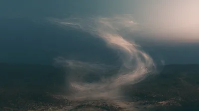 Dust Devil Swirling Over Dry Desert Ground
