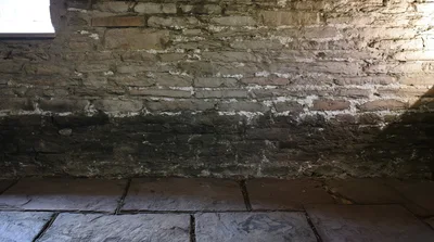 Rustic Stone Wall And Flagstone Floor Interior