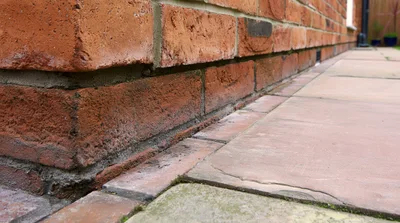 Close Up Of Brick Wall And Patio Paving