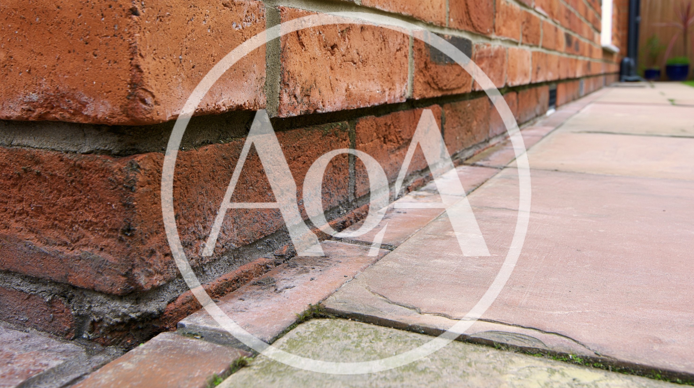Close Up Of Brick Wall And Patio Paving