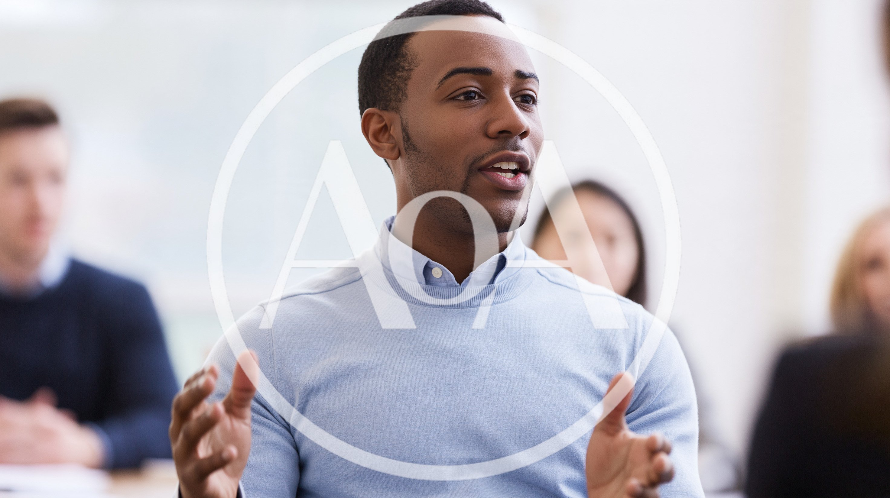 African American Man Speaking During Business Meeting