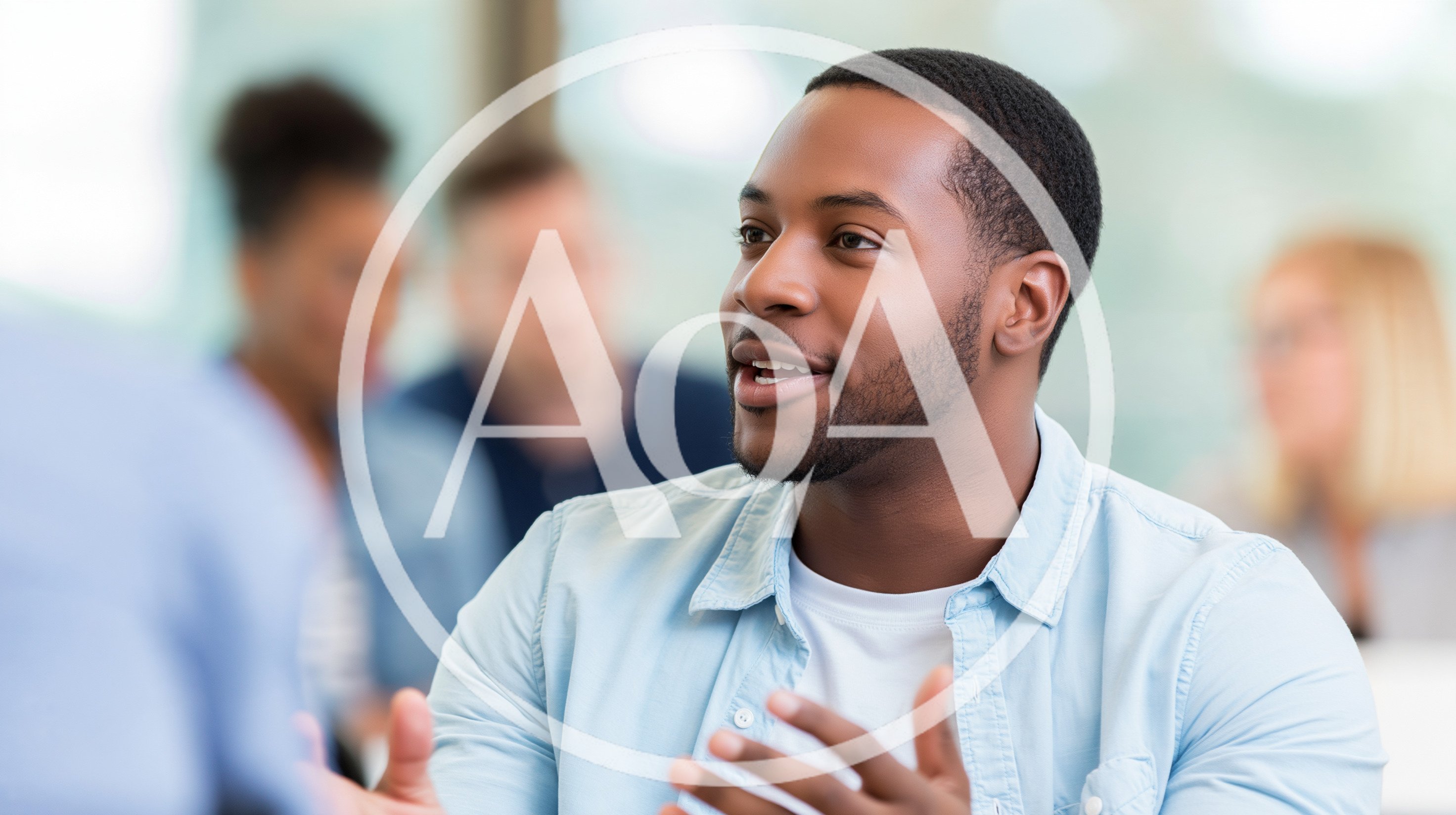 Young African American Man Speaking During Office Meeting