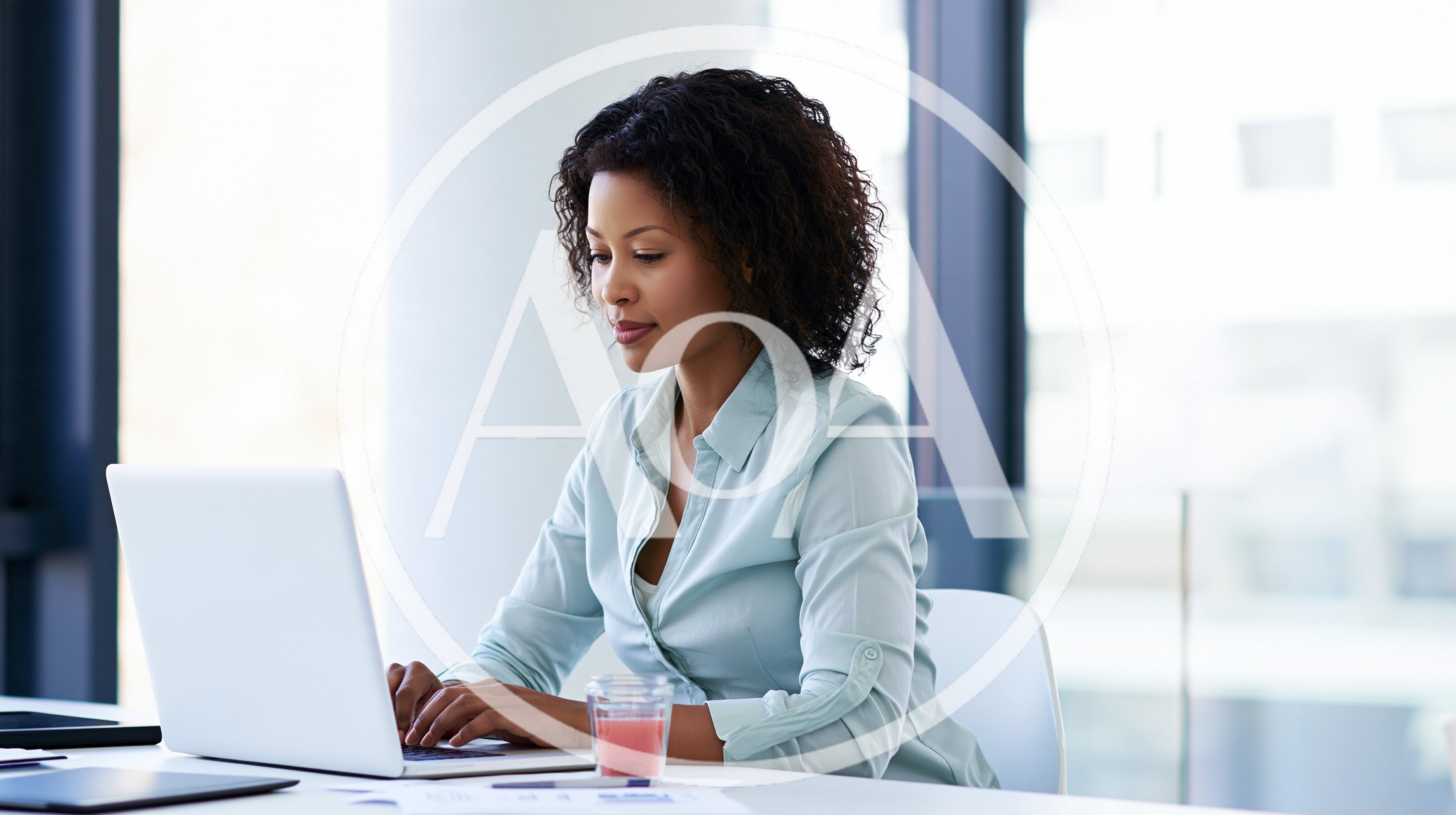 Professional Woman Working On Laptop In Modern Office