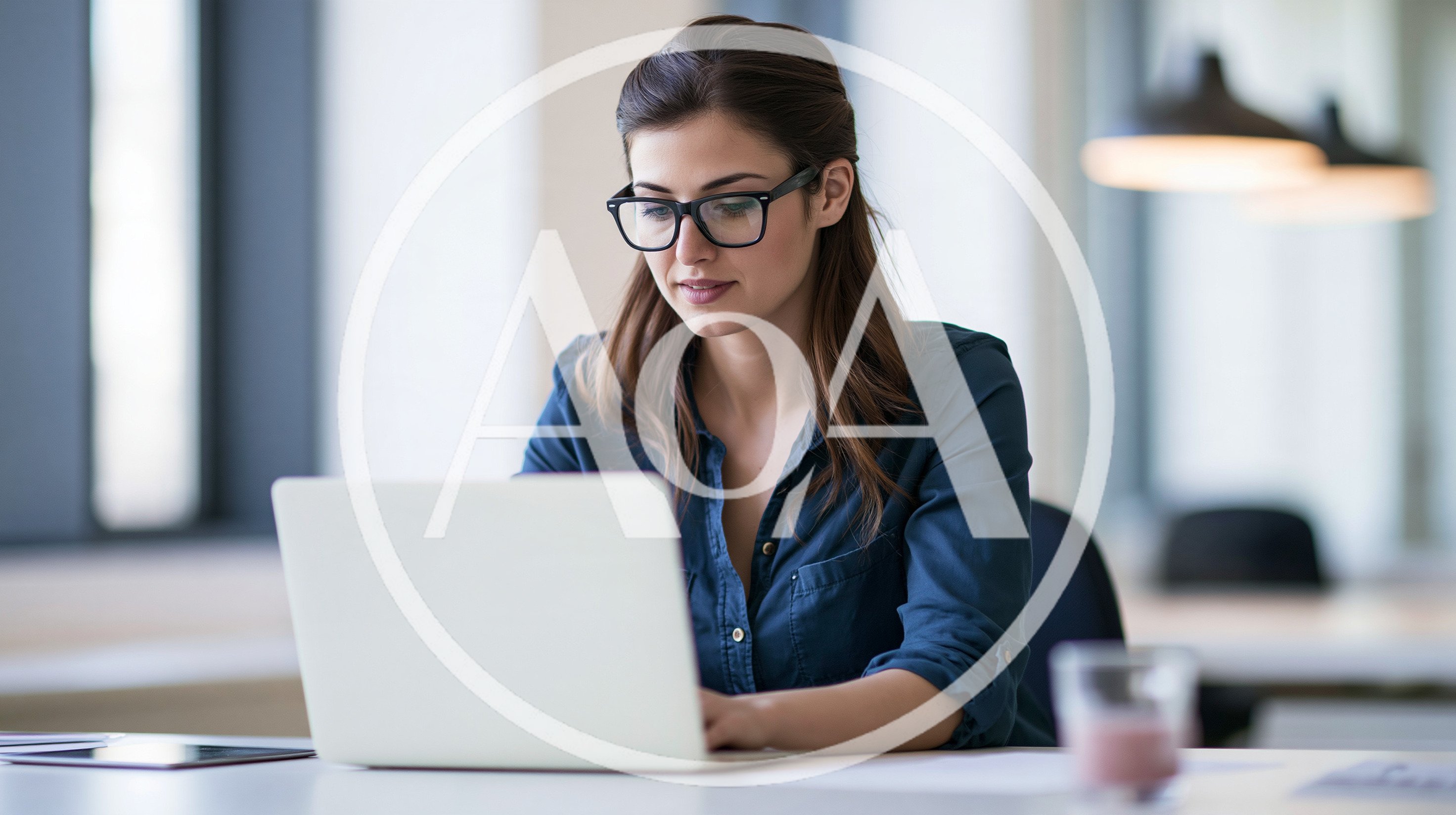 Professional Woman Working On Laptop In Modern Office