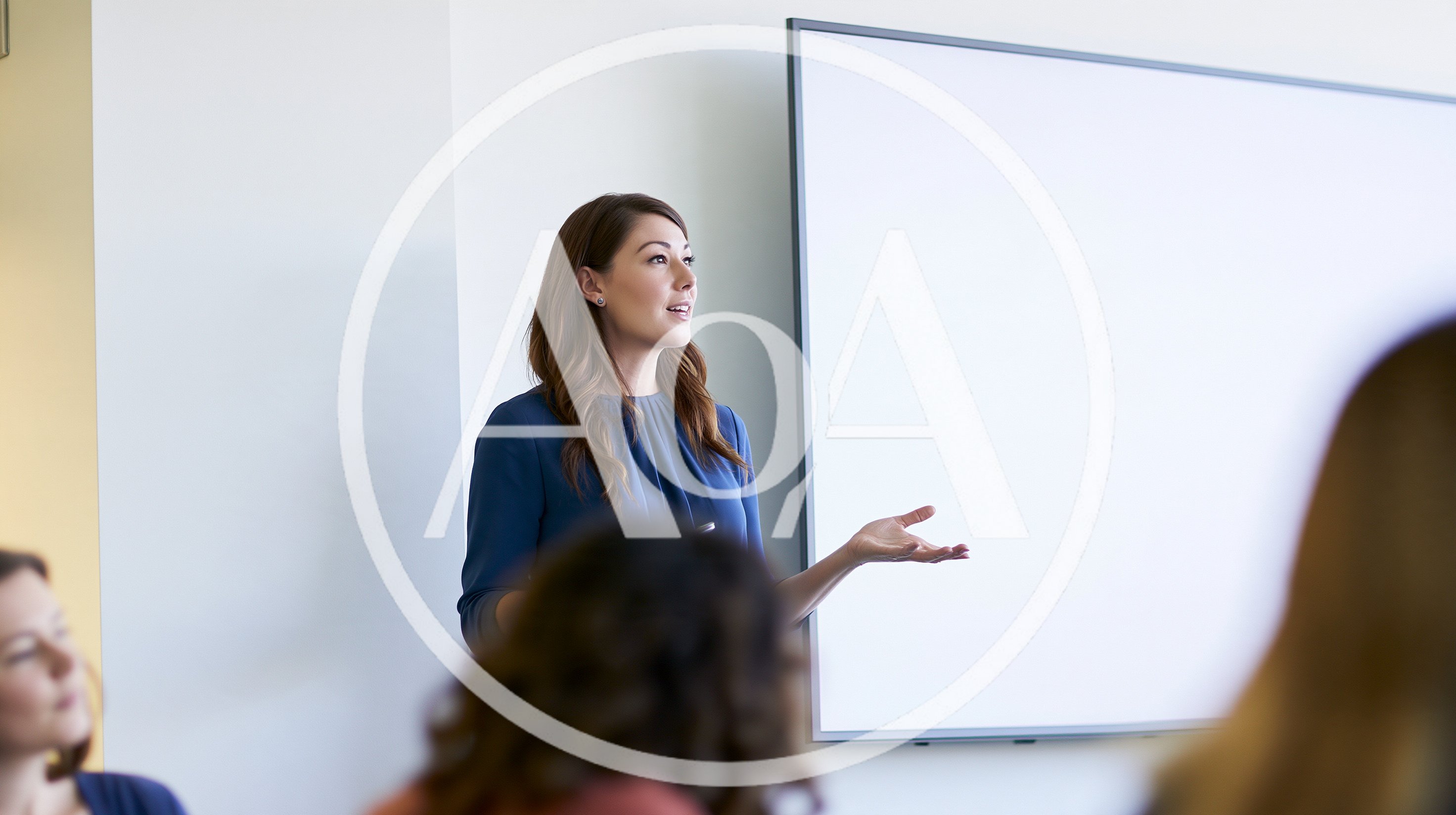 Professional Woman Giving A Presentation In A Meeting