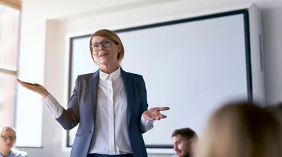 Professional Businesswoman Giving A Presentation In A Meeting Room