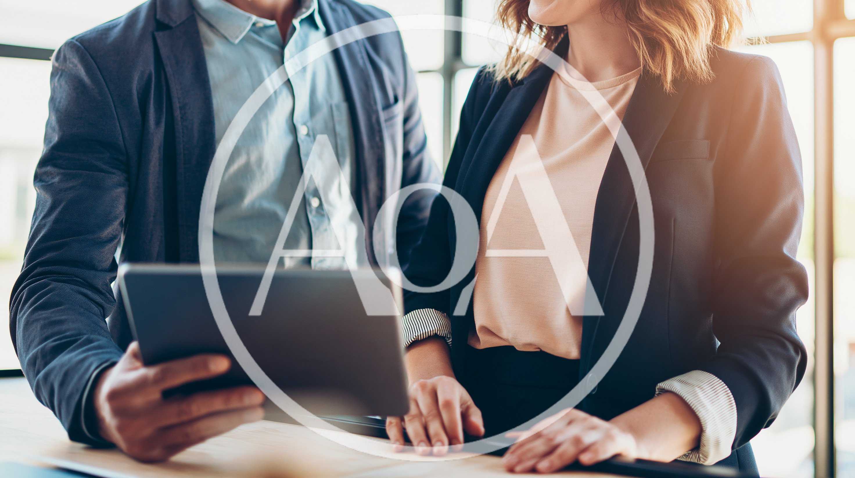 Business Professionals Collaborating On A Digital Tablet