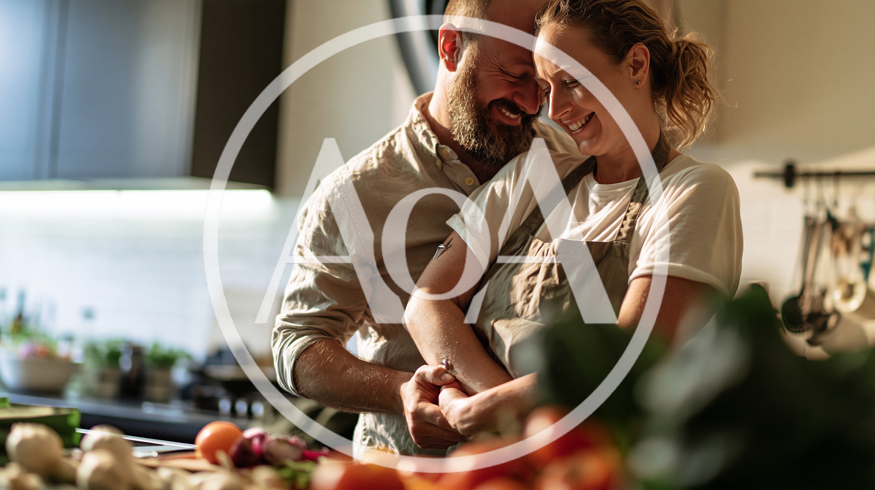Affectionate Couple Embracing While Cooking Together In Kitchen