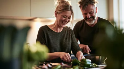 Happy Couple Cooking Together In A Modern Kitchen